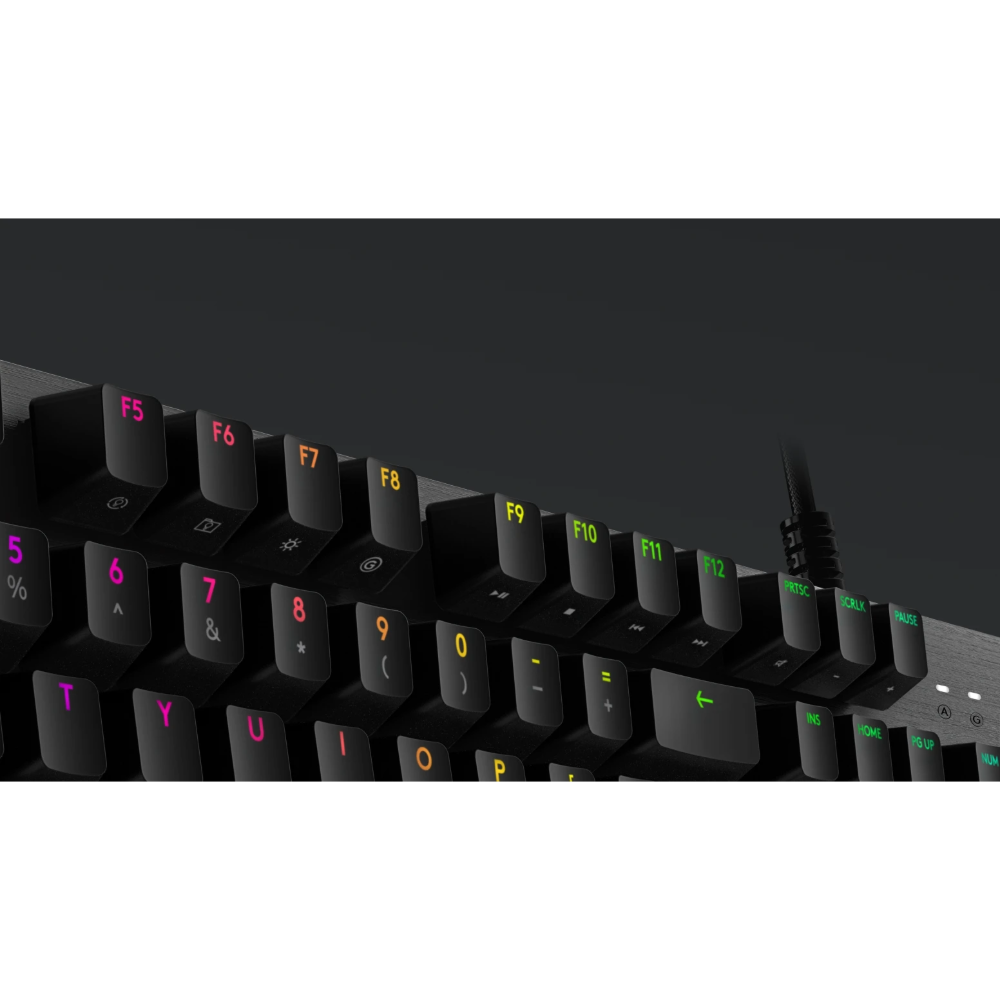 Close-up of a black keyboard with RGB lighting on a dark background