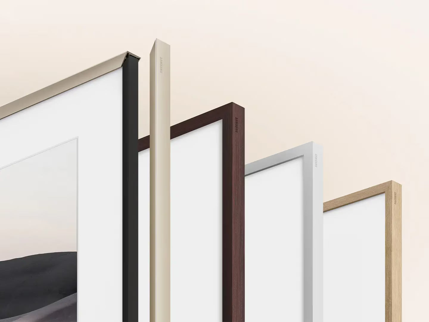 Four different colored picture frames on a white background