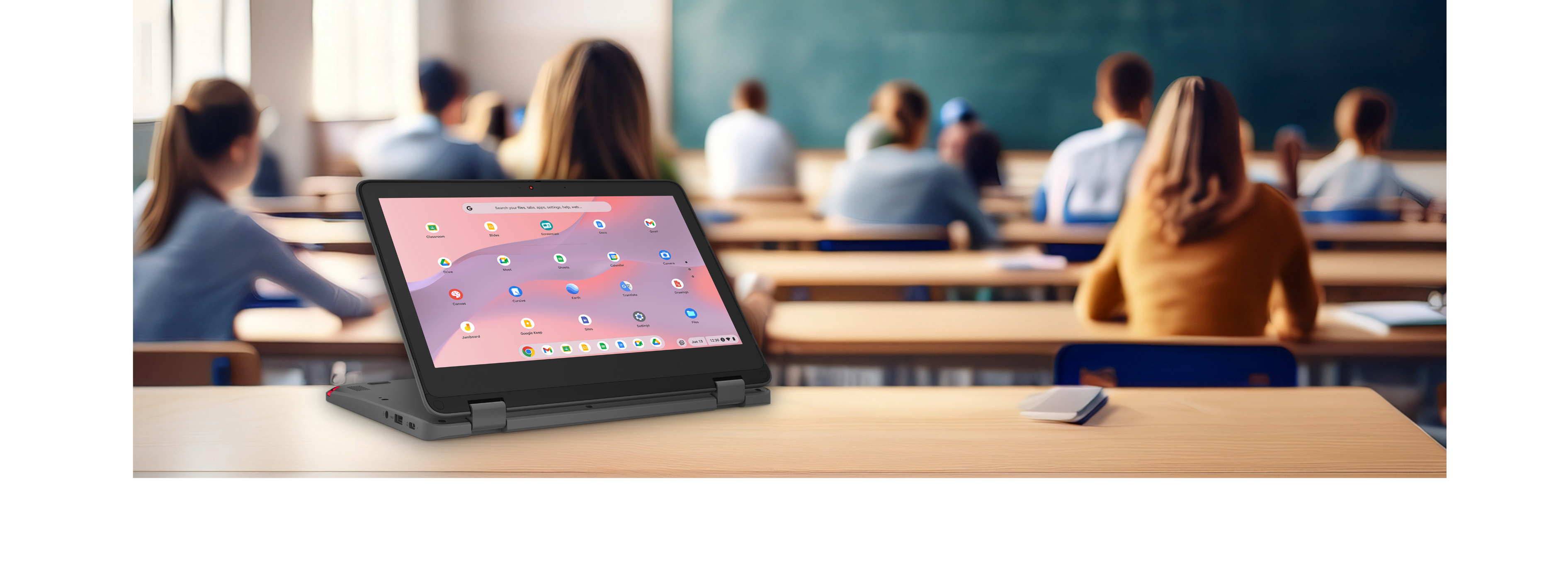 Laptop on a desk in a classroom with students and a chalkboard in the background