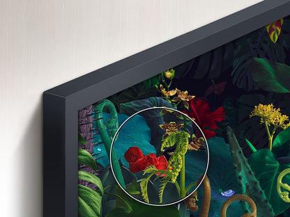 Close-up of a framed artwork with vibrant colors and intricate details.