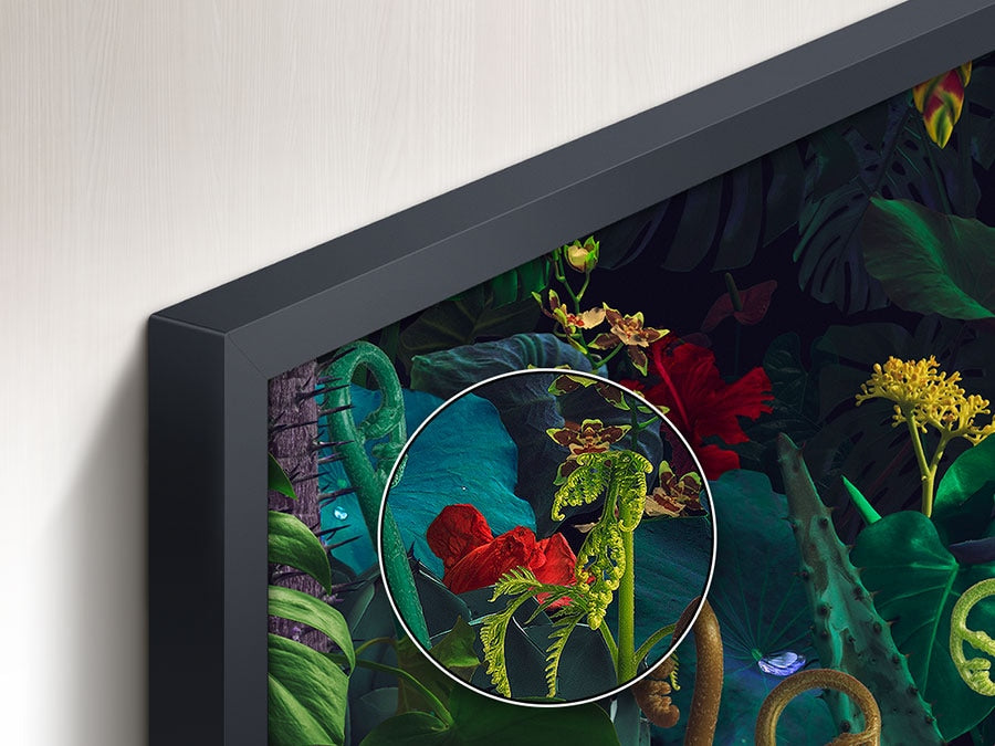 Close-up of a framed artwork with vibrant colors and intricate details.